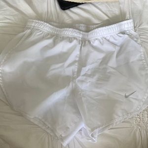 White Nike shorts